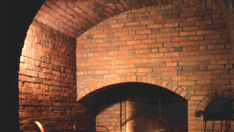 brick arches over fireplace