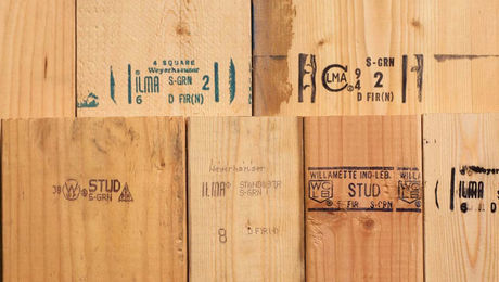 lumber with grade stamps on it