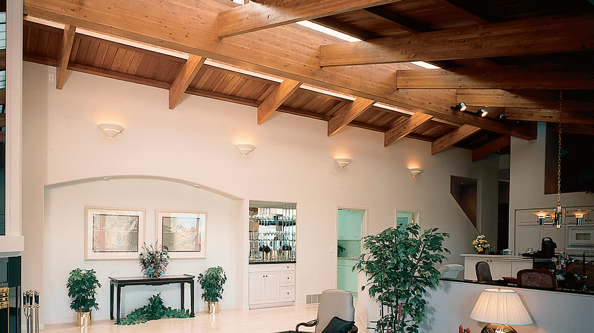 room with engineered wood ceilings