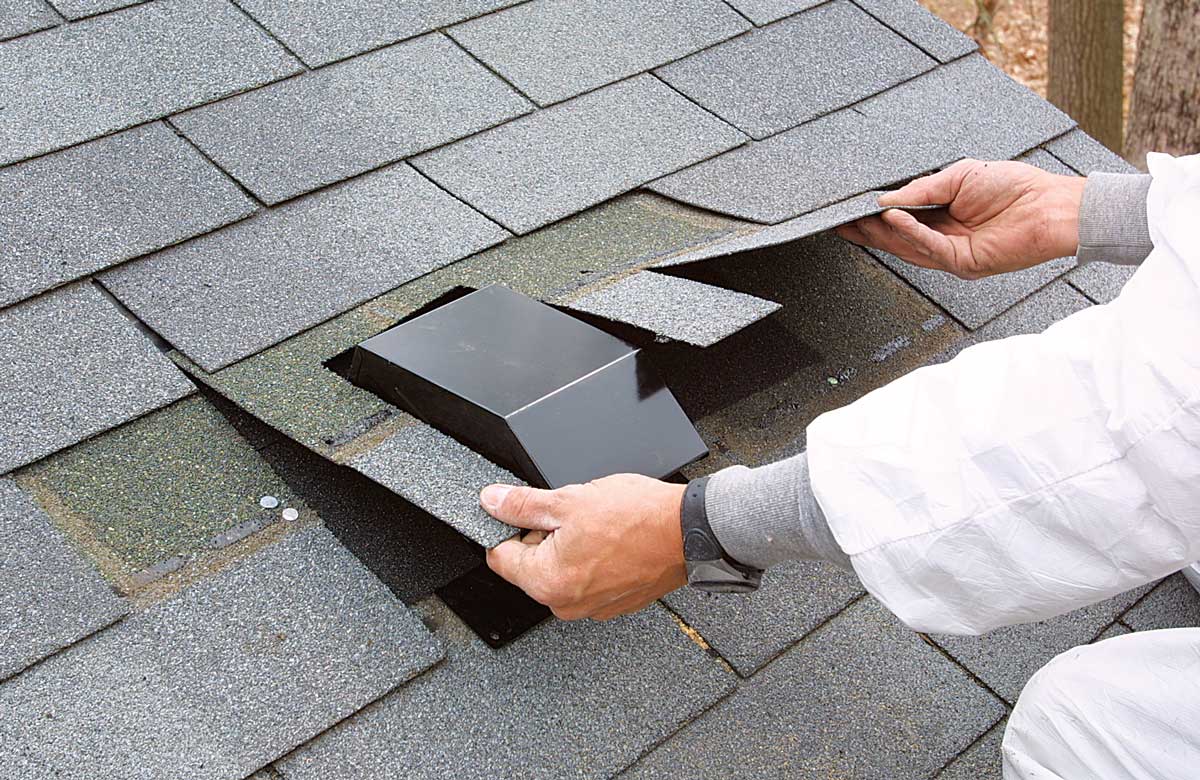 Cut around the vent and replace the shingles. Be-fore the shingles are re-placed, they are cut to fit closely around the vent, overlapping the flange on the top and both sides.