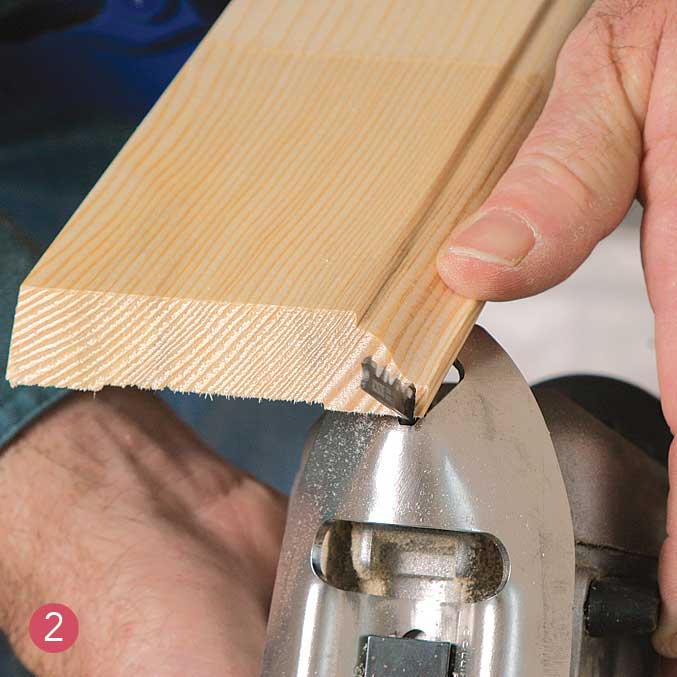 Pull the saw toward you to make a relief cut at the top of the miter, leaving the sliver big enough so that it doesn’t break off easily. 