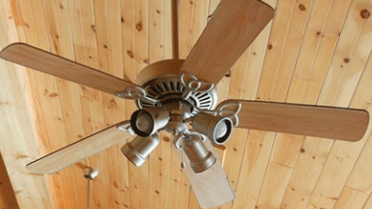 new ceiling fan against wood ceiling 