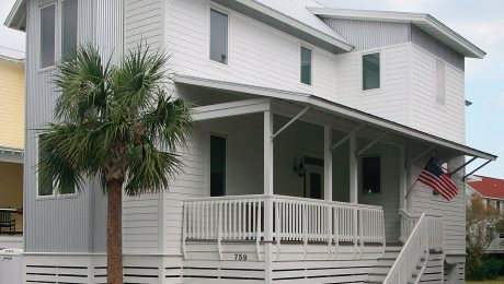 Raised home with a porch