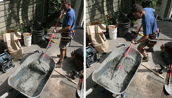 mixing water and concrete together in wheelbarrow