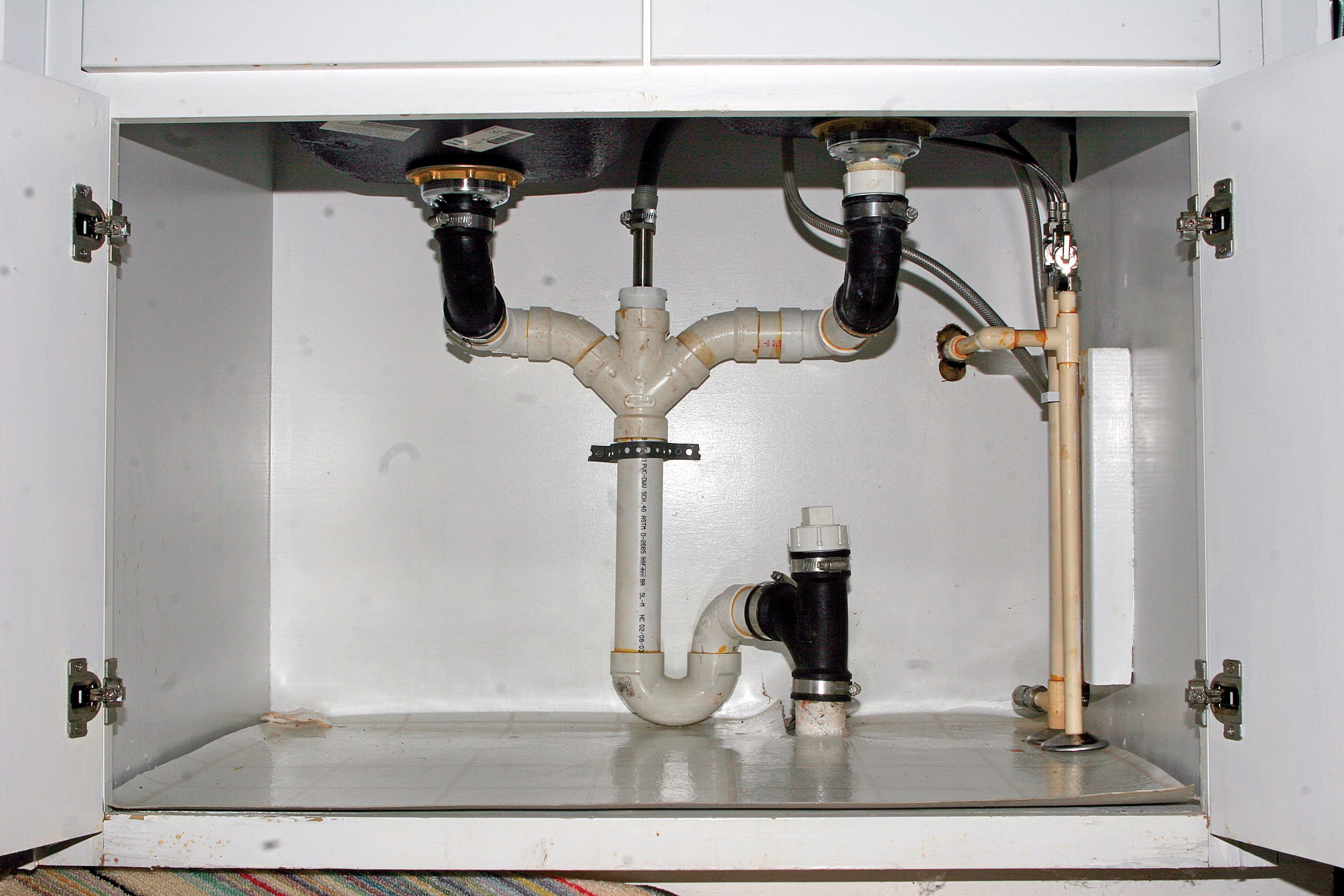 How to Seal Plumbing Pipes Under Sink: A Guide - R.S. Andrews