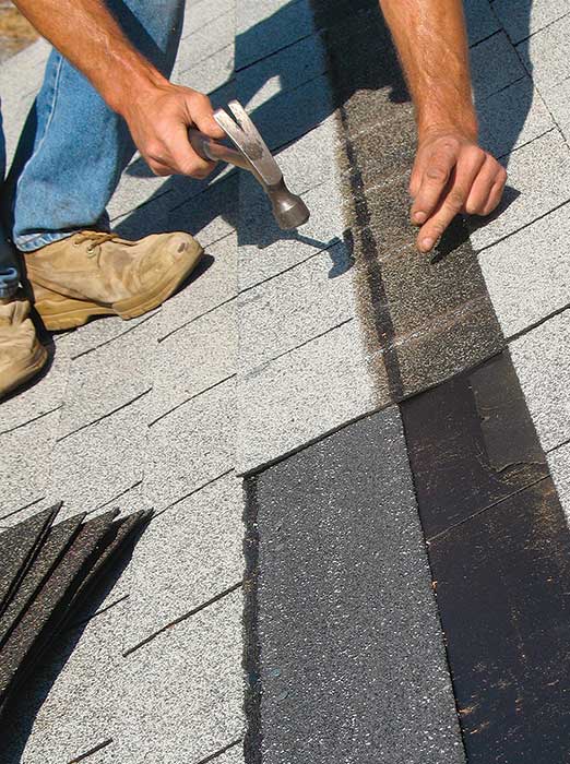 Reshingle. Apply a starter strip cut from new shingles before reinstalling the old shingles.