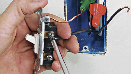 person repairing wiring