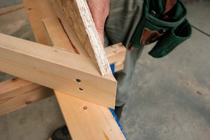 If the rafters stick up slightly, trim their length from either end, using the same saw settings as the original cut. 