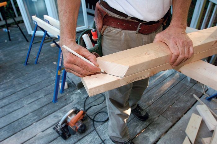 Check the fit. Confirm that the first hip rafter fits correctly, then use it as a template to cut the other side.