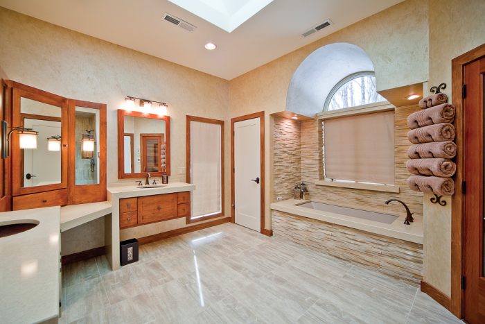 split-face tile in a bathroom near the sink