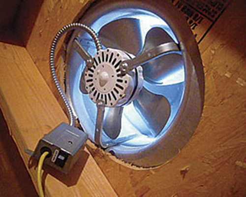 A ventilator mounted into wood
