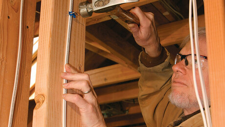 fastening electrical cable to framing