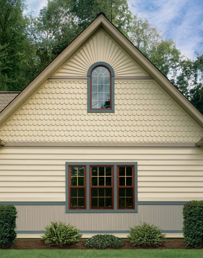 Look again. Vinyl siding comes in as many forms as real wood, including trim pieces. 