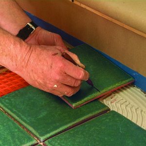 mark cuts on the tile