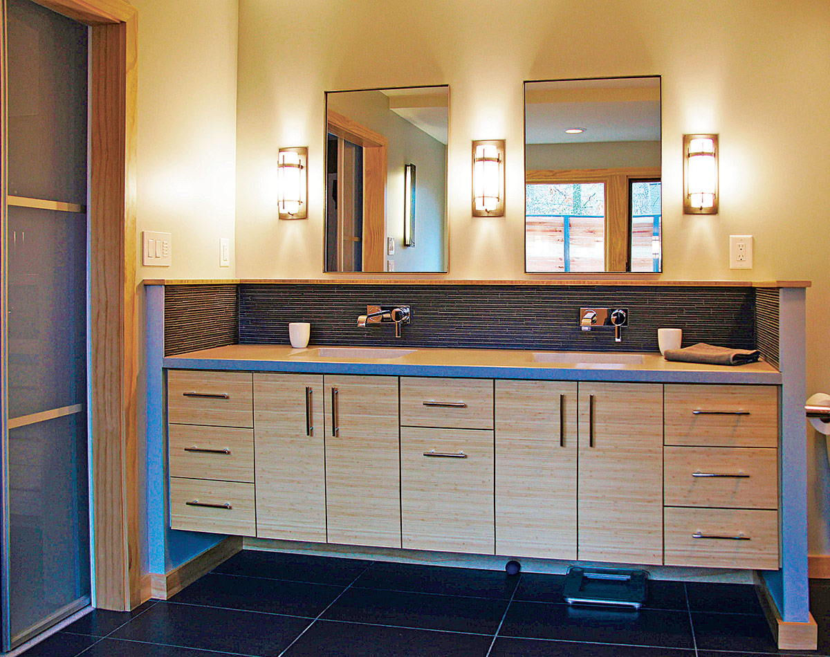 bathroom vanity with mirrors and sconces