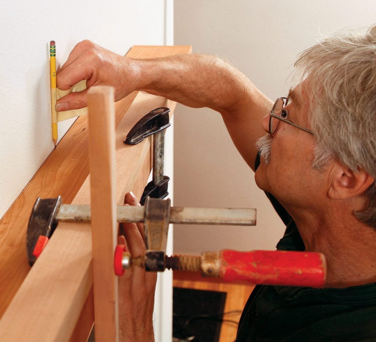 clamp the block to the shelf and a long stick for easier scribing on a mantel
