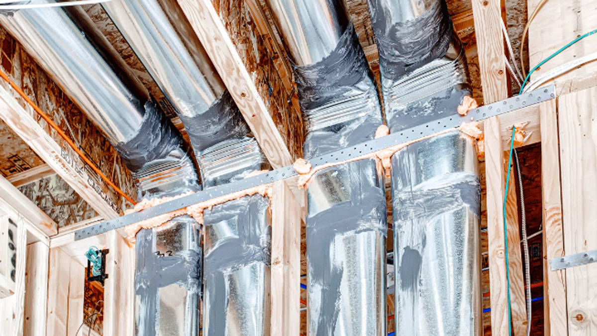 HVAC ducts are sealed with mastic and checked for airtightness. Heated or cooled air reaches its destination with a loss of less than 7%. A nonhardening sealant was applied along the top plate of walls bordering the attic. It forms an airtight gasket when drywall is screwed in place.