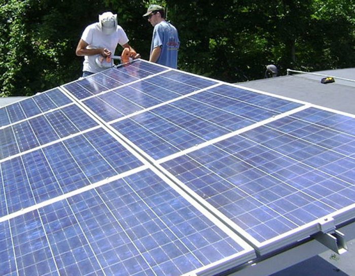 applying solar panels on roof