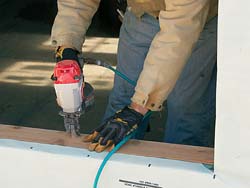  nail a piece of siding along the rough sill with 13⁄4-in. roofing nails
