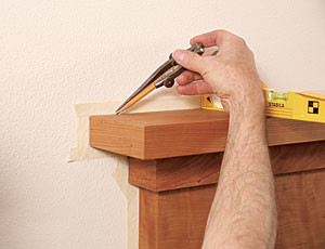 drawing a line above the top piece of the mantel
