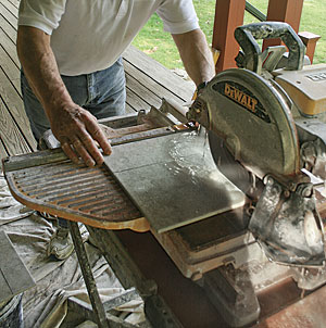 tile saw getting ready to cut a ceramic tile