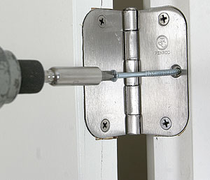 Secure the door with a long screw. 