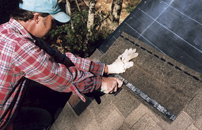 installing shingles on roof 
