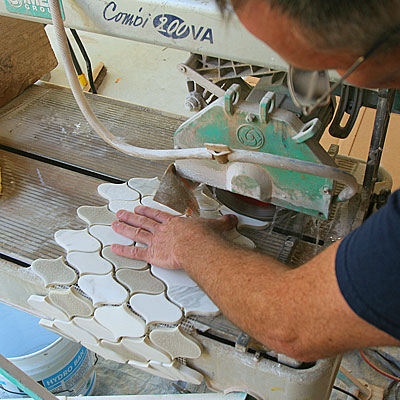 trim sheets of mosaic tile
