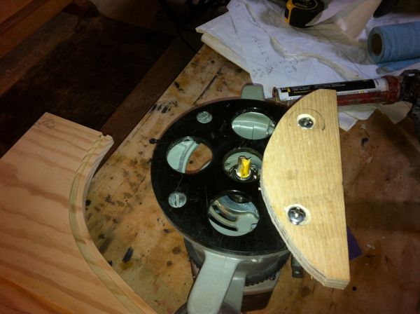 The router set up to cut the groove on the inside of the two sides