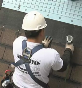 installing-shingles-house-roof
