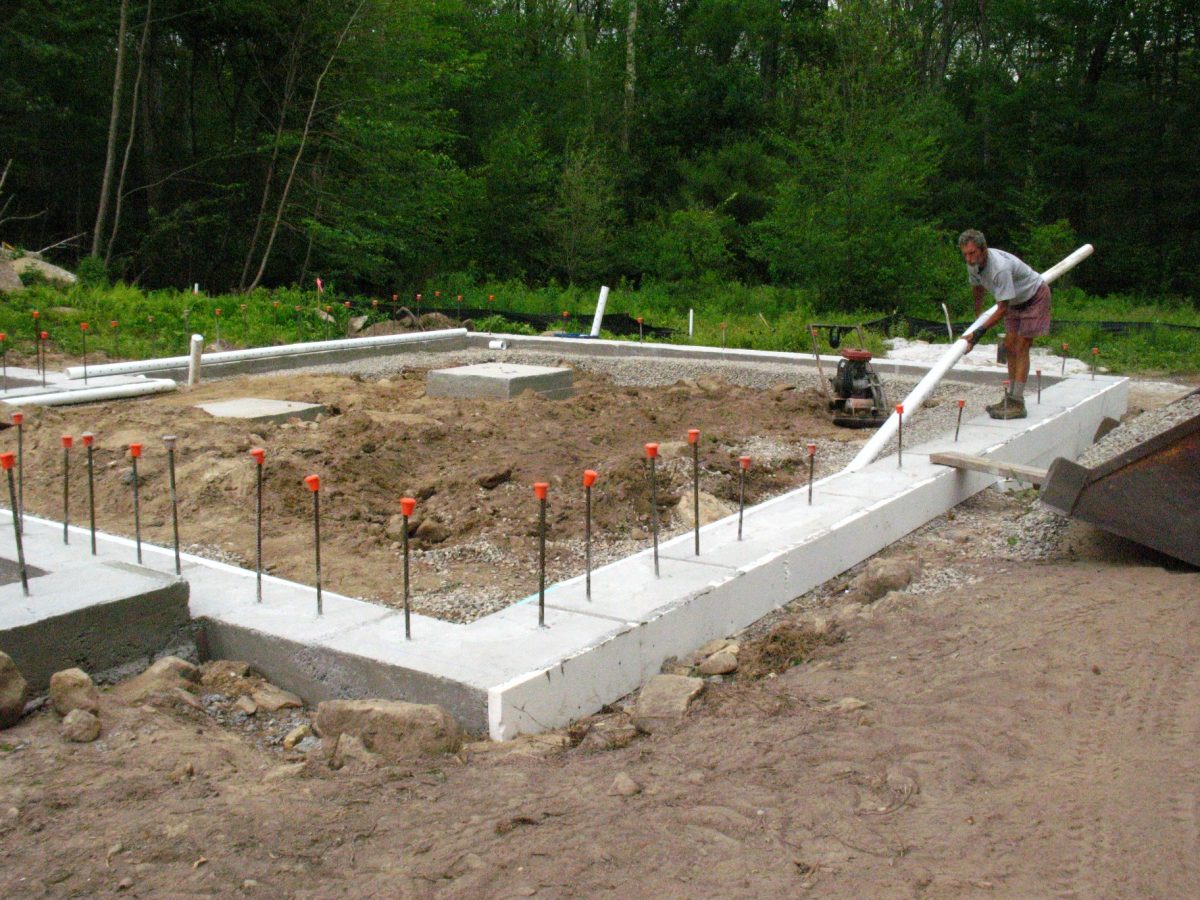 installing pipe around foundation