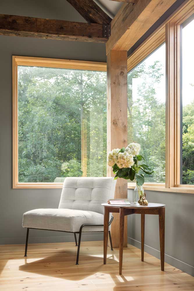 Integrity Wood-Ultrex windows give this home a sleek facade with black fiberglass exteriors and accent the rustic decor with warm, pine interiors.