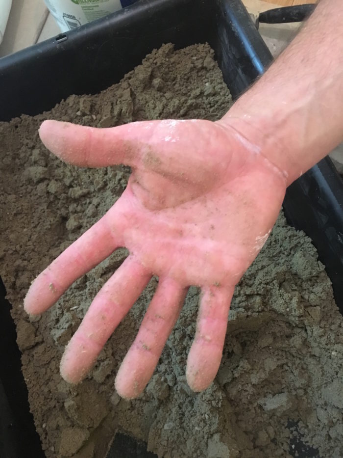 Once you drop the mortar out of you hand, your hand should be relatively clean and not wet