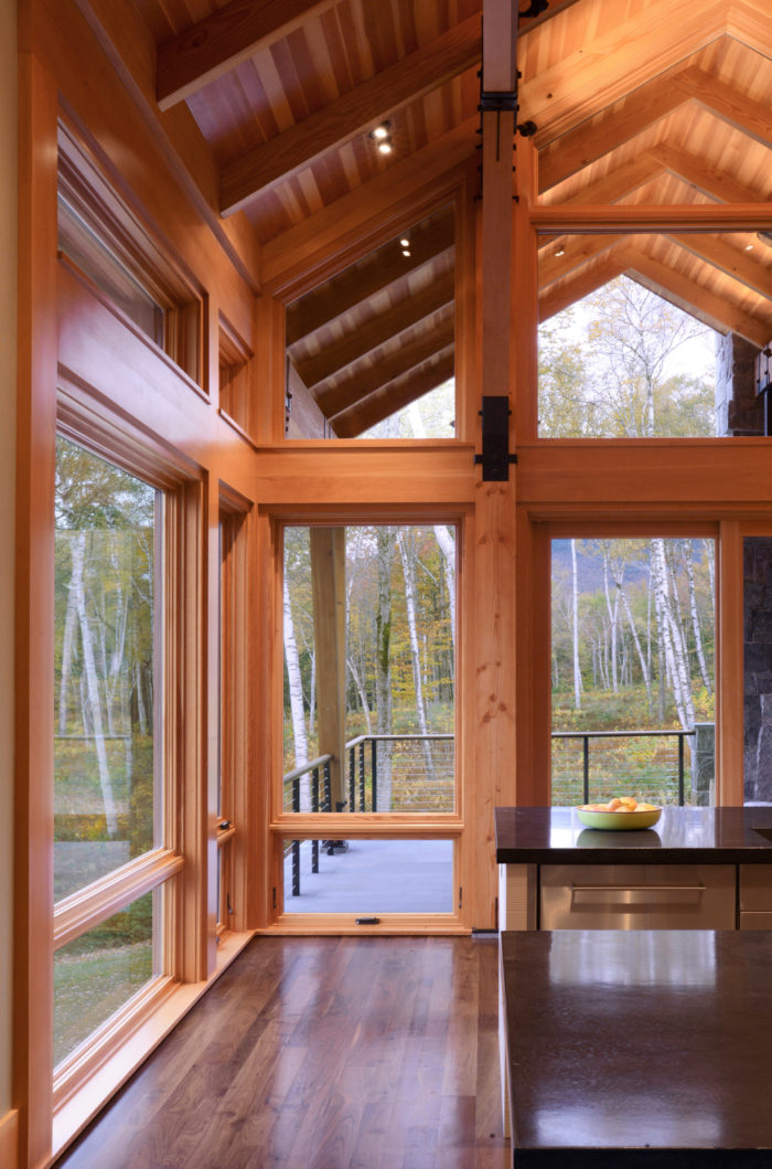 Let no light be lost. Windows extend all the way to the peak roof to open up the space to incredible heights.