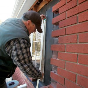 use weather stripping for consistent spacing between the bricks