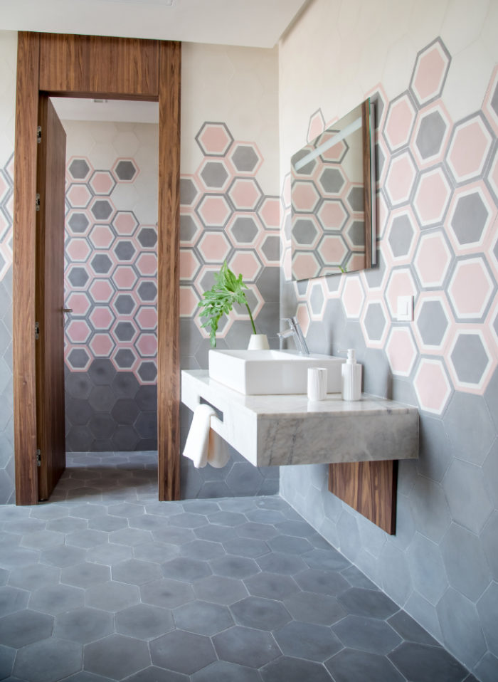 motifs borrowed from ancient Moroccan art and architecture shed light on a custom bathroom