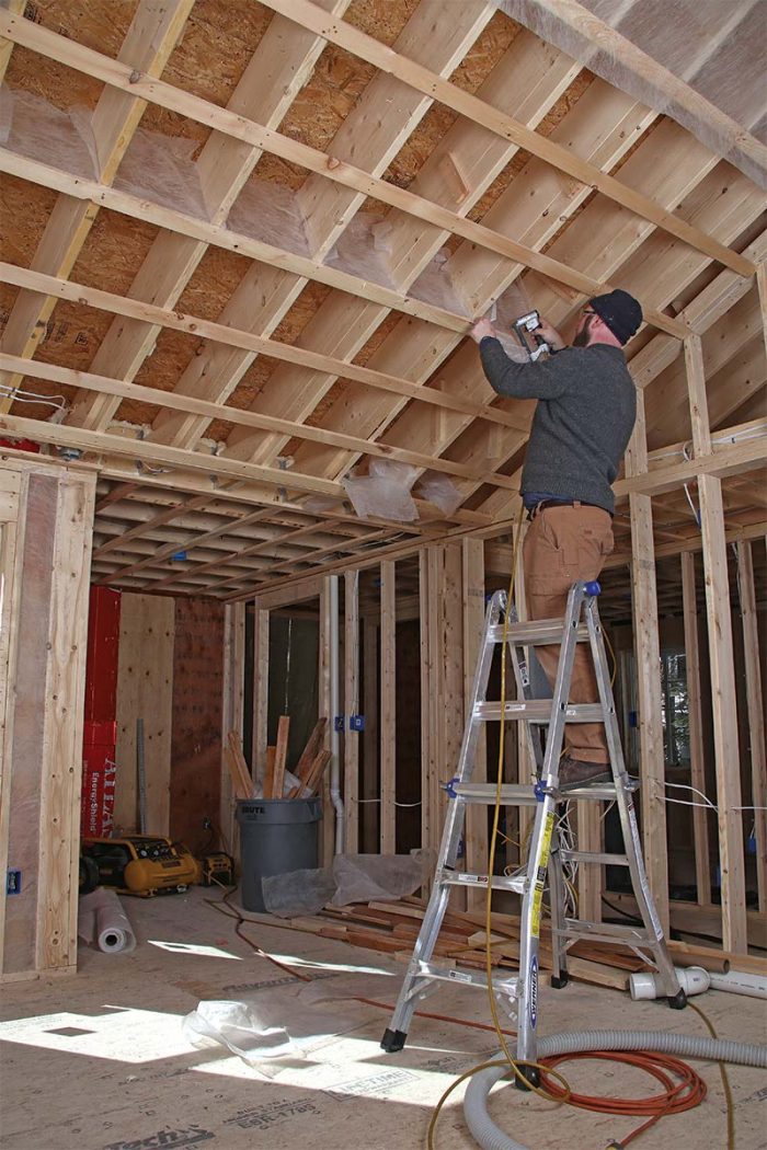 Divide deep cavities when installing netting for dense-pack cellulose insulation