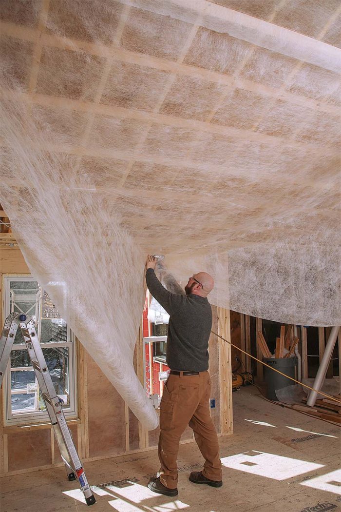 Drape and pull when installing netting for dense-pack cellulose insulation