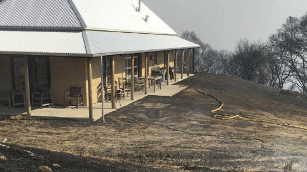 Do or do not disturb? Disturbing the site to create a defensible perimeter around this home in Northern California helped save it from last summer’s wildfires.