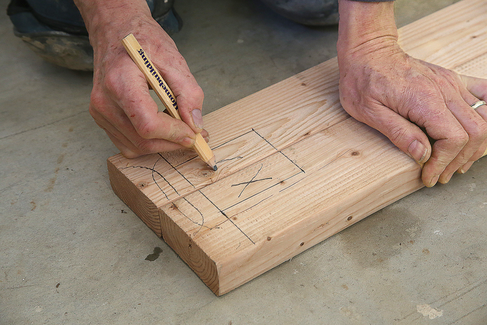 Nailed together in an L-shape, one stud is the outside nailer for sheathing, while the inner one will extend one stud thickness past the intersecting wall to serve as a drywall nailer.