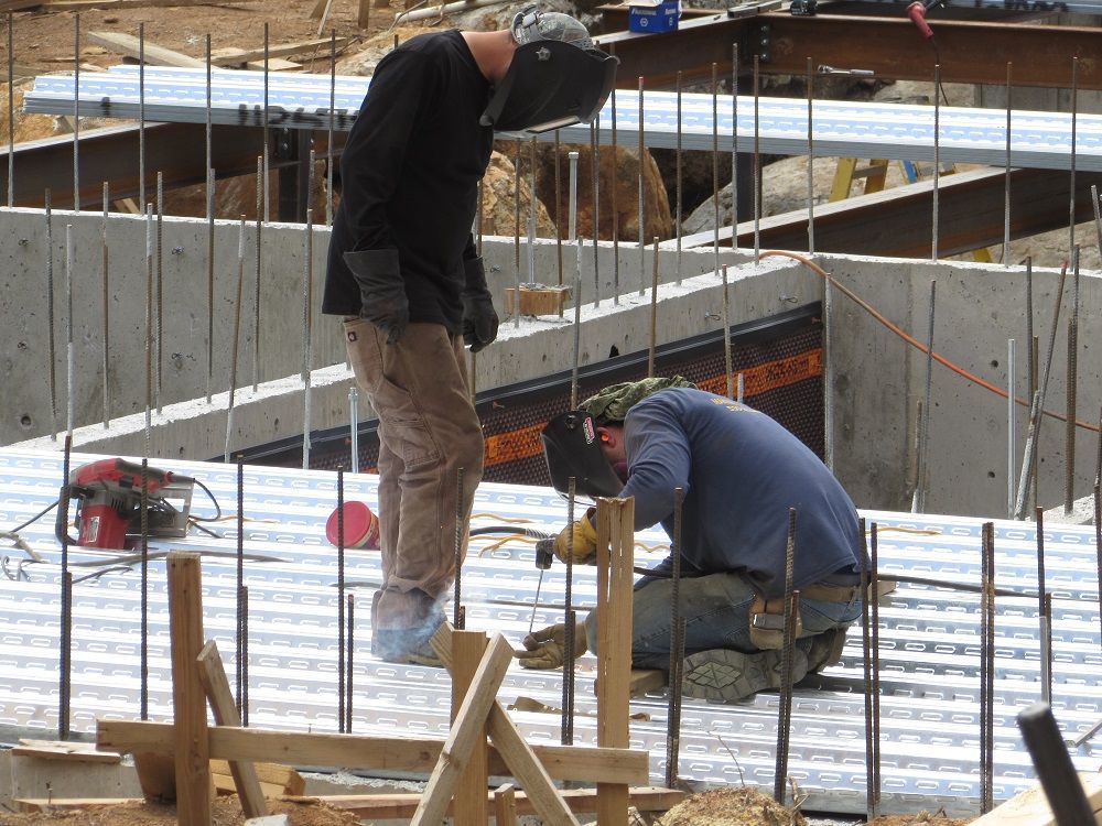 Steel Beams and a Metal Pan Deck Fine Homebuilding
