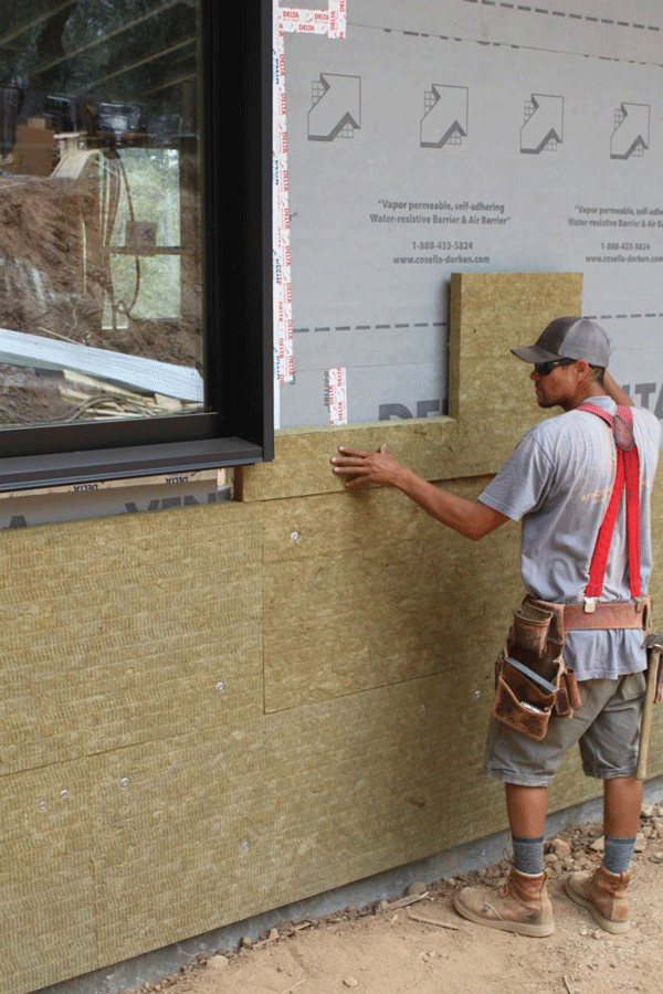 The rigid board cuts nicely to fit around windows and doors.