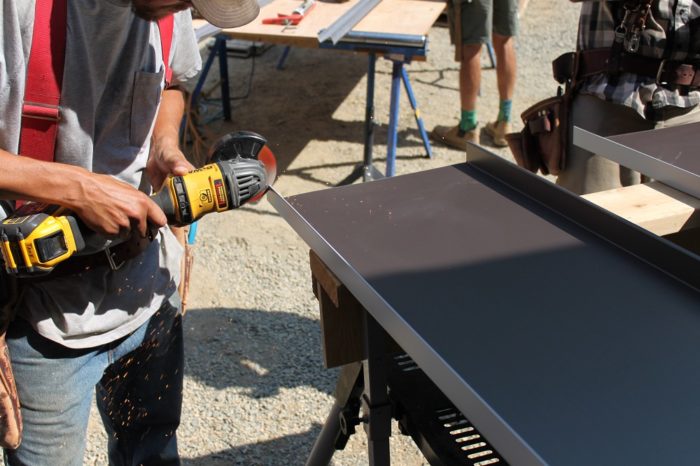 image of cutting metal roofing