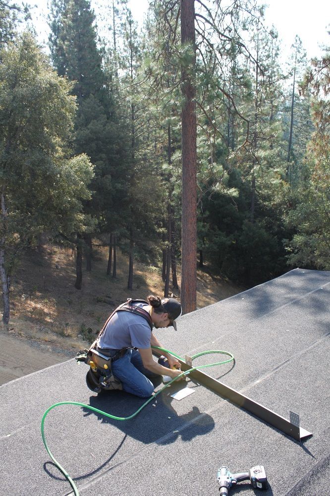 image of riveting metal roofing transitions