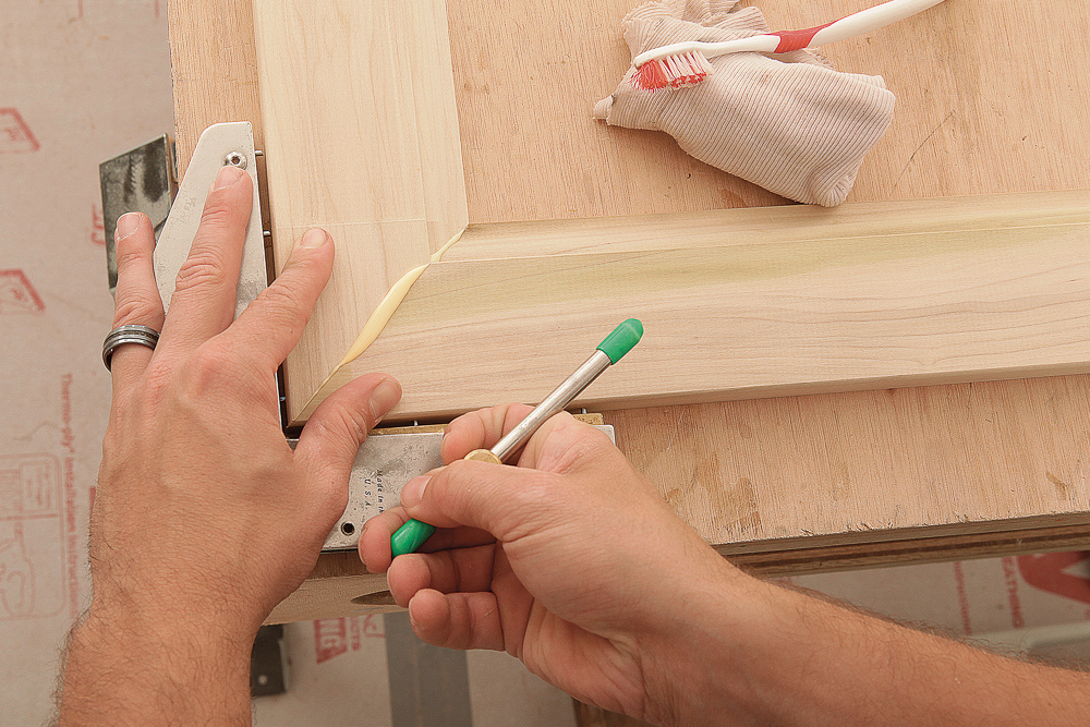 pushing miters tight by hand; window trim