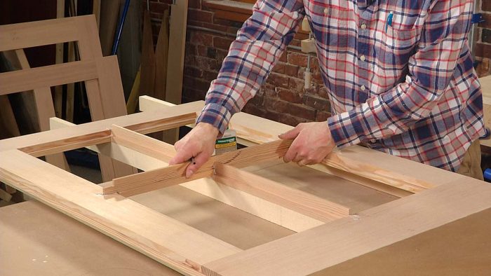 Lap the muntins. A tight-fitting half-lap joint is key, so sneak up on the fit until the pieces slide together snugly without forcing them.