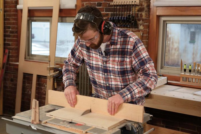 Notching makes mortises. Make a series of nibble cuts to create notches in the rails and stiles of the middle layer that will accept the muntin tenons.