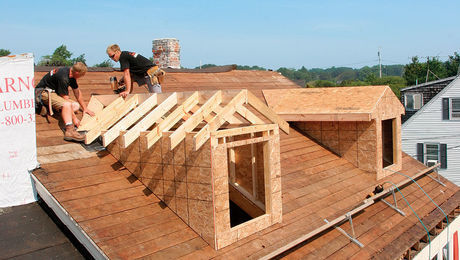 Men installing roof