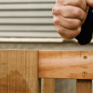 19. Flush the top of the rail with the top of the posts. Double-check to make sure the balustrade is aligned the way you want it.