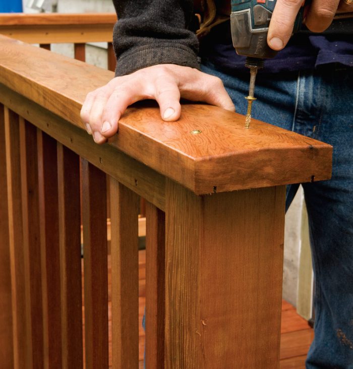 7. Overhang the post with the cap by several inches where you will add a stair railing.